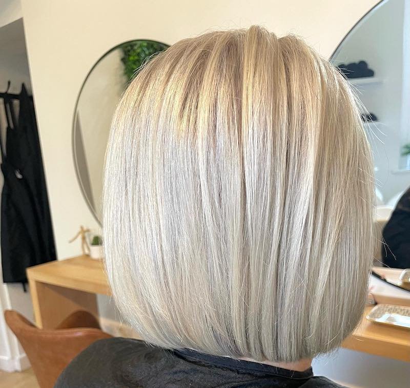 after photo of short white blonde hair cut